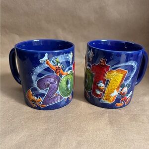 Set of Two Blue 2011 Walt Disney World Celebration mugs. 16oz